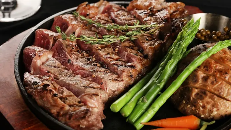 Fire-grilled boneless New York Strip steak with char marks