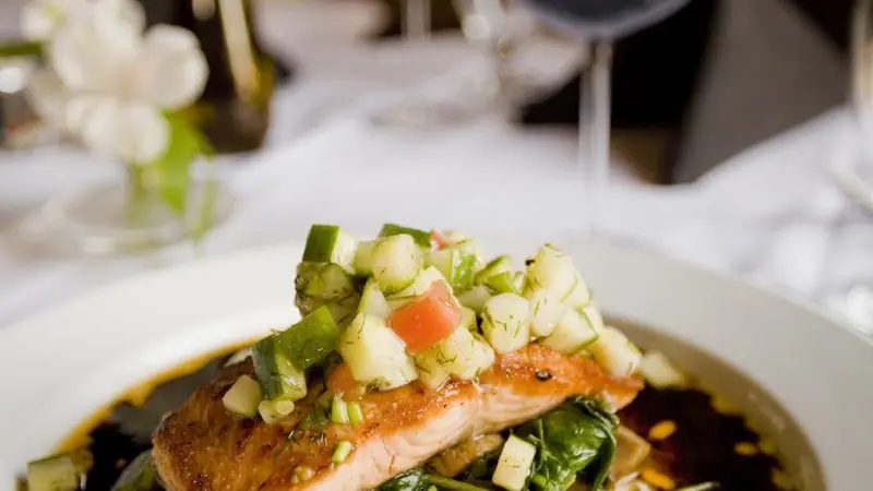 Glazed Atlantic salmon fillet on a bed of rice pilaf
